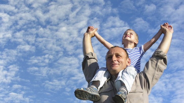 grandfather with grandson under cloudfield